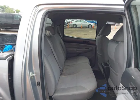 2014 Toyota Tacoma Base V6 z USA, uszkodzony, nr VIN 3TMLU4EN9EM156197
